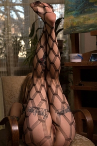 Tattooed Chick In Sexy Fishnet