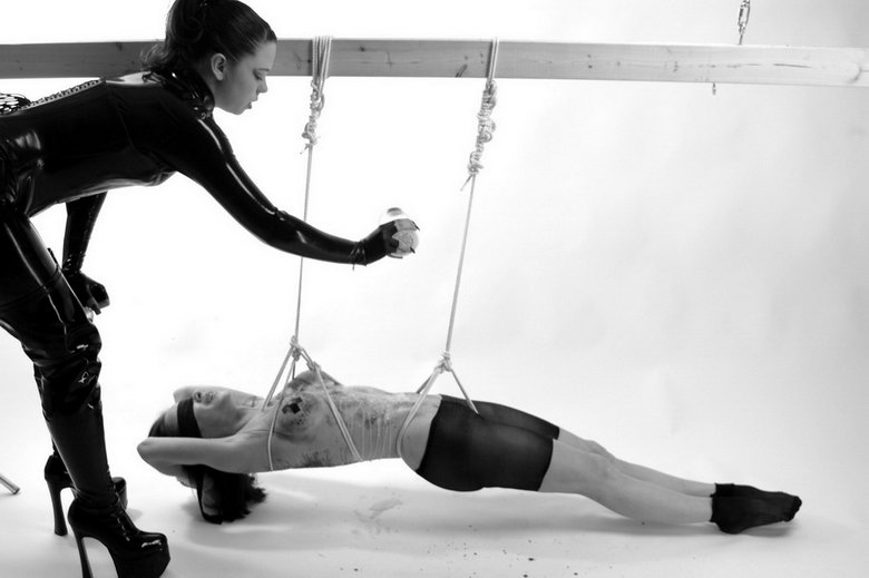 Naked chick is tied, by her master