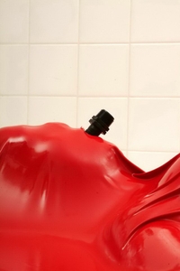 Blond babe is bound in air tight latex