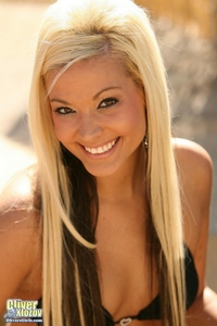 Blonde Woman strips out a black bikini
