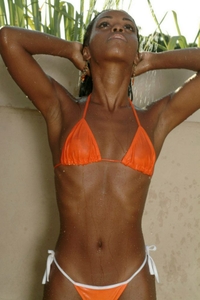 Naomi under the garden shower