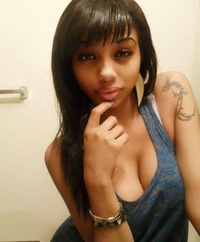 Busty mulatto chick's selfpics