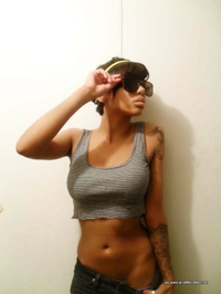 Busty mulatto chick's selfpics