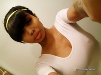 Busty mulatto chick's selfpics