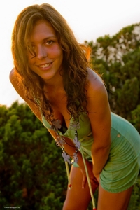 Cute nudist in the sunset