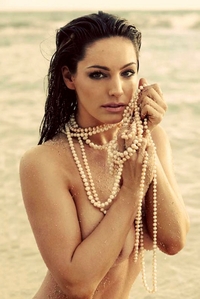Kelly Brooke is nude on the beach