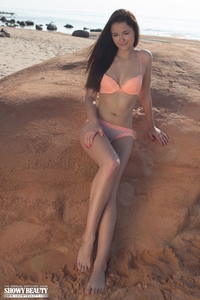 Cute brunette on the beach