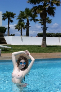 Heidi In Sunglasses By The Pool