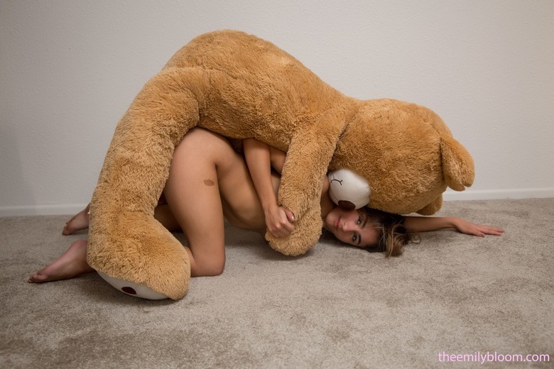 Silly with her teddy bear