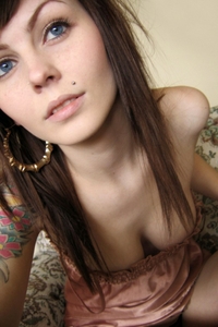 Tattooed teen cutie